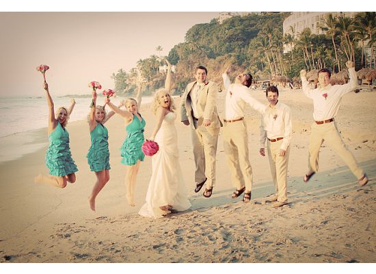 beach bride and groom with groomsmen and bridesmaids